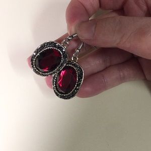Brand new dangle statement earrings.